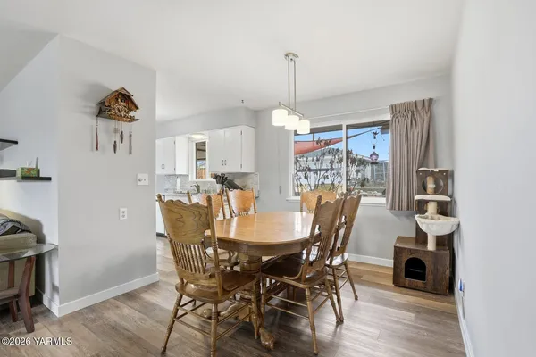 a garage with table and chairs