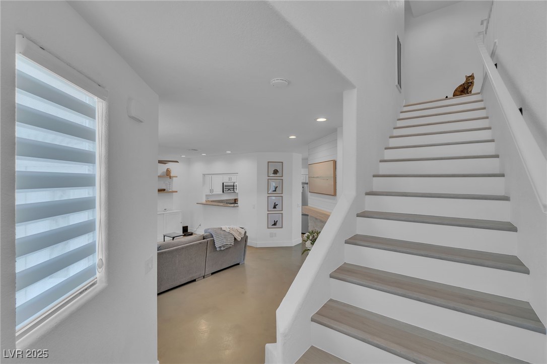 655 Florence Drive Boulder City, NV 89005 - Photo 18 of 63 Stairs with recessed lighting and concrete floors