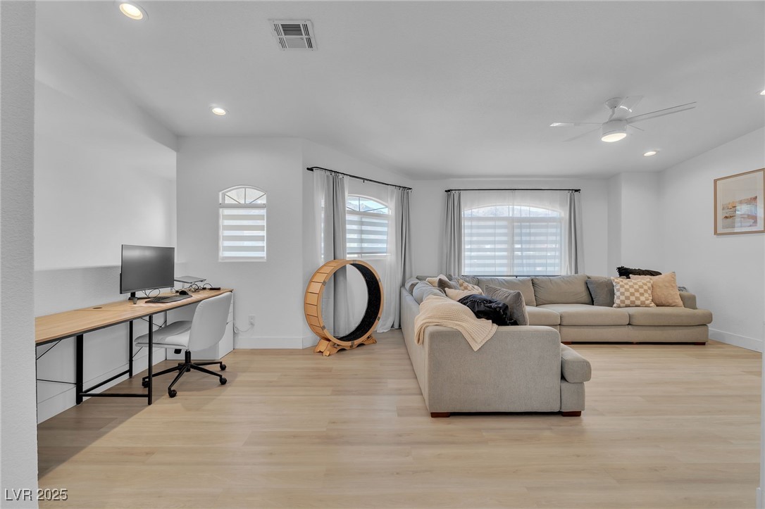 655 Florence Drive Boulder City, NV 89005 - Photo 19 of 63 Upstairs Living area with recessed lighting, light wood-type flooring, an office area, and ceiling fan. Could be converted to a 3rd bedroom with remaining space for an office/loft.