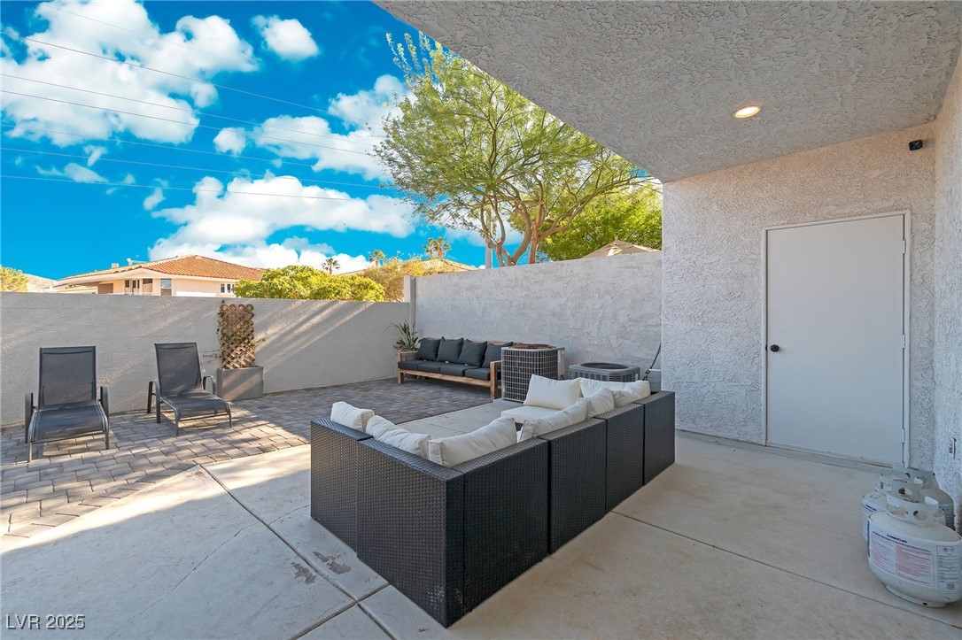 655 Florence Drive Boulder City, NV 89005 - Photo 39 of 63 Fenced backyard with a patio and an outdoor hangout area