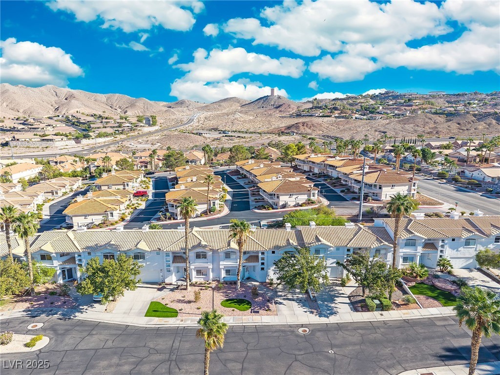 655 Florence Drive Boulder City, NV 89005 - Photo 40 of 63 Aerial view of residential area with a mountain backdrop