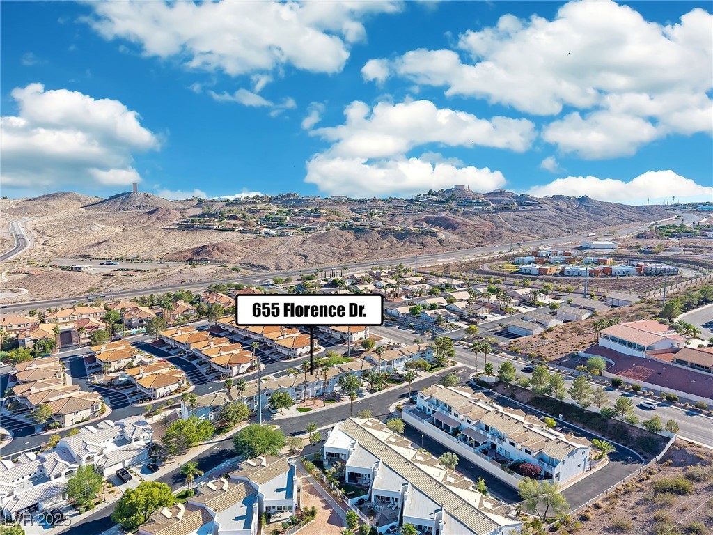 655 Florence Drive Boulder City, NV 89005 - Photo 43 of 63 Aerial view of property's location with nearby suburban area and a mountain backdrop