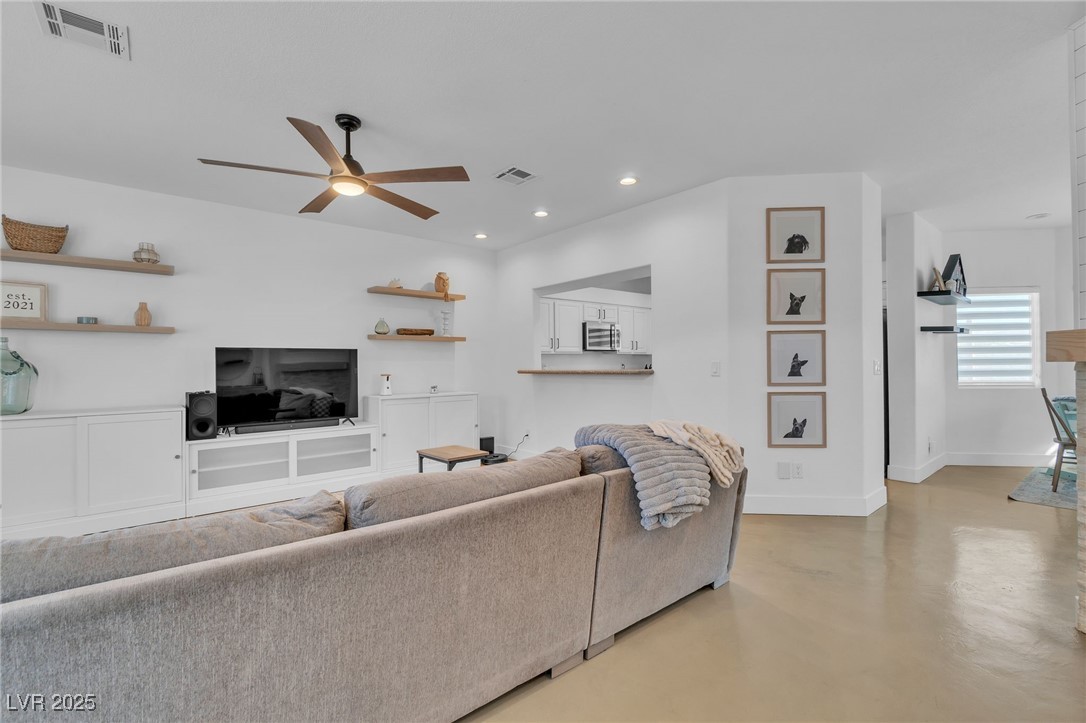 655 Florence Drive Boulder City, NV 89005 - Photo 6 of 63 Living room featuring concrete floors, recessed lighting, and ceiling fan