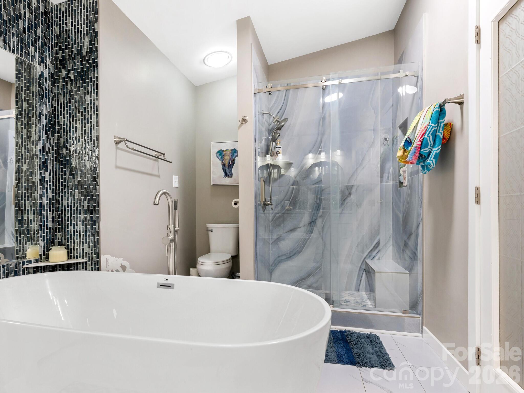 2219 State Rd S-13-106 Pageland, SC 29728 - Photo 14 of 29 a bathroom with a tub and shower