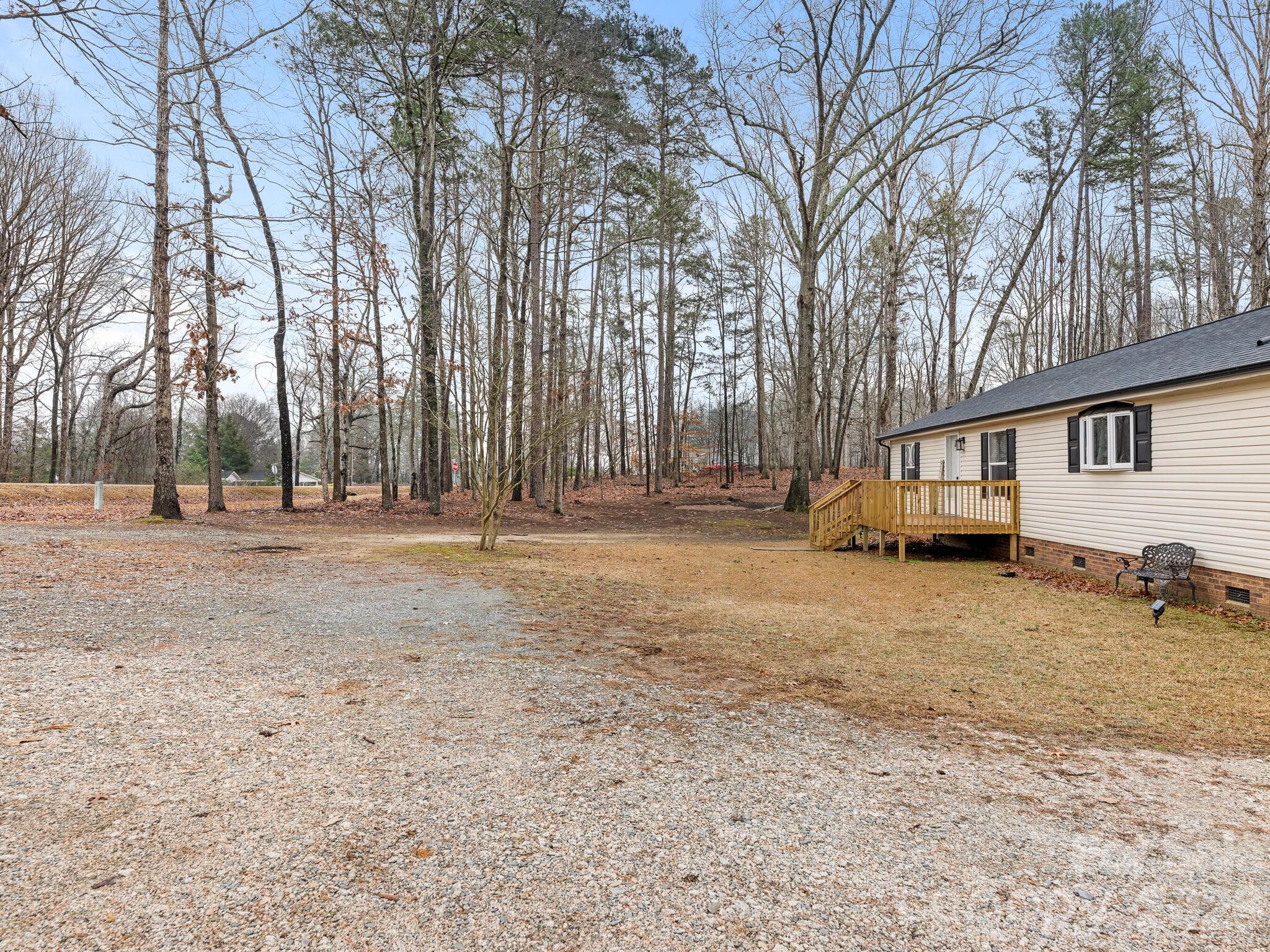 2219 State Rd S-13-106 Pageland, SC 29728 - Photo 20 of 29 a view of yard with large trees