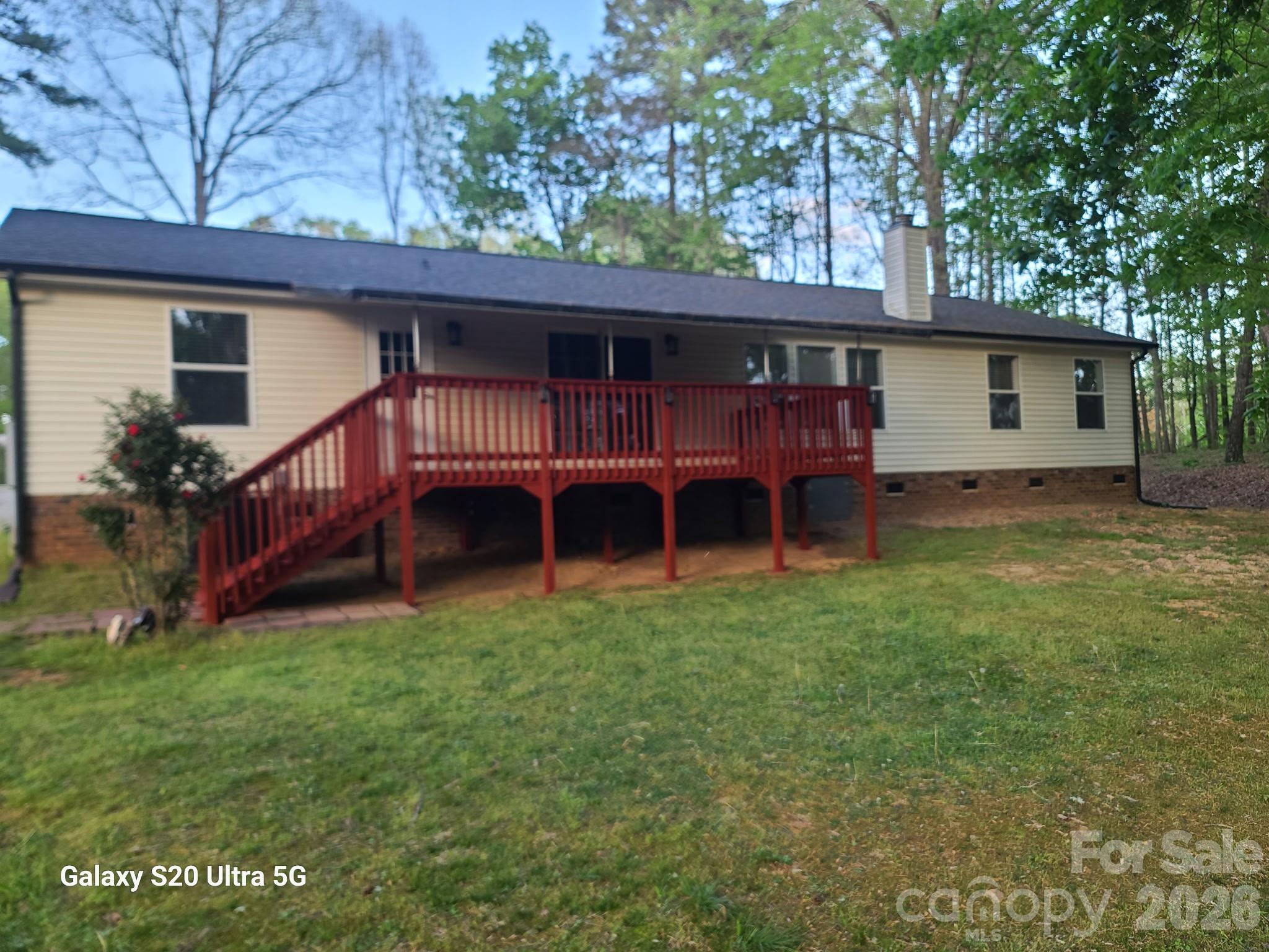 2219 State Rd S-13-106 Pageland, SC 29728 - Photo 24 of 29 a view of a house with a backyard