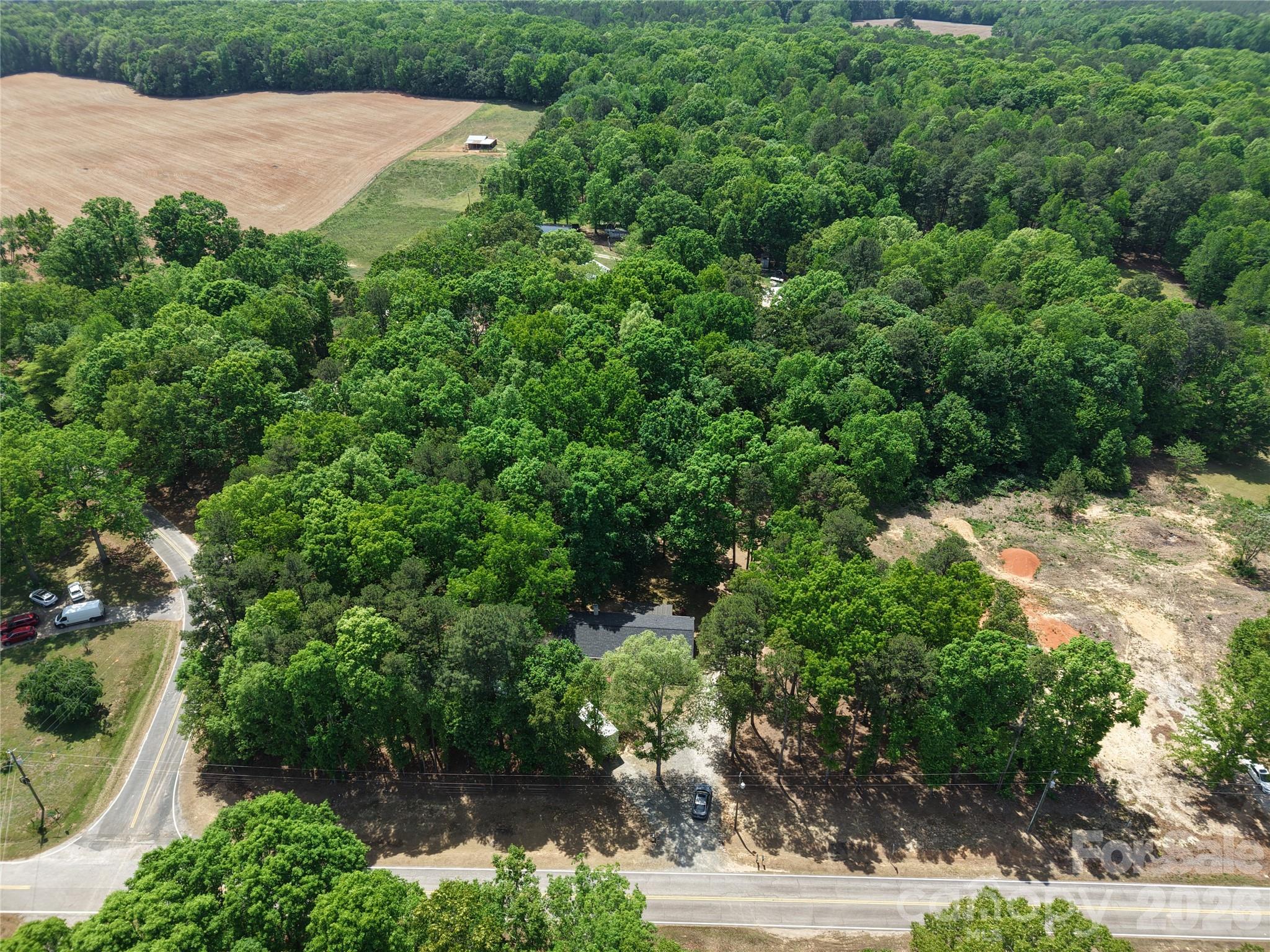 2219 State Rd S-13-106 Pageland, SC 29728 - Photo 27 of 29 an aerial view of a house with a yard