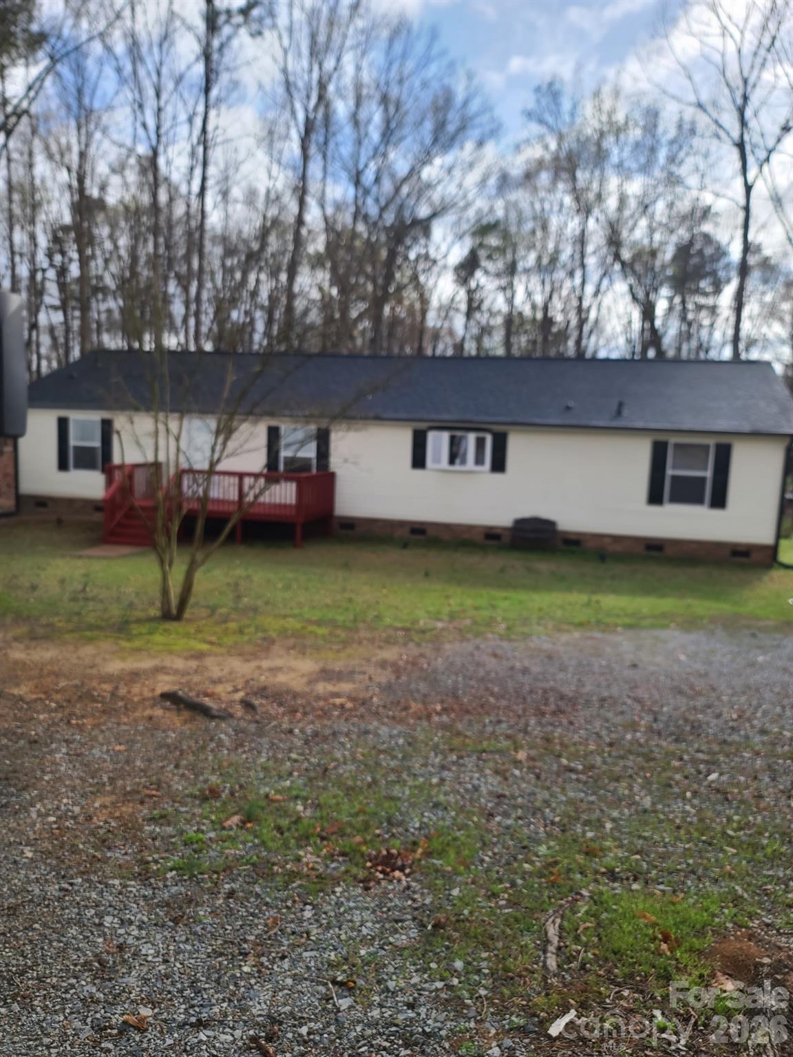 2219 State Rd S-13-106 Pageland, SC 29728 - Photo 28 of 29 a view of a house with a yard and a large tree