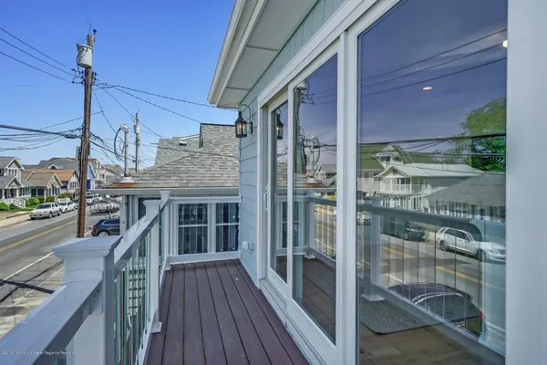 a view of a balcony with staircase