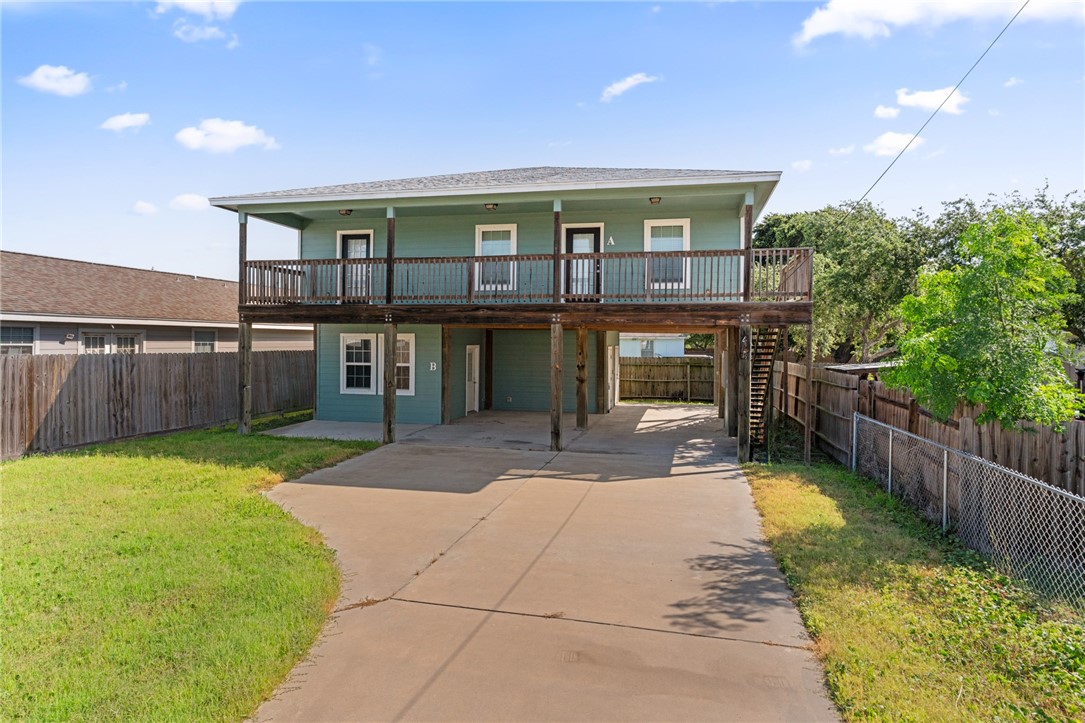 a house view with a garden space