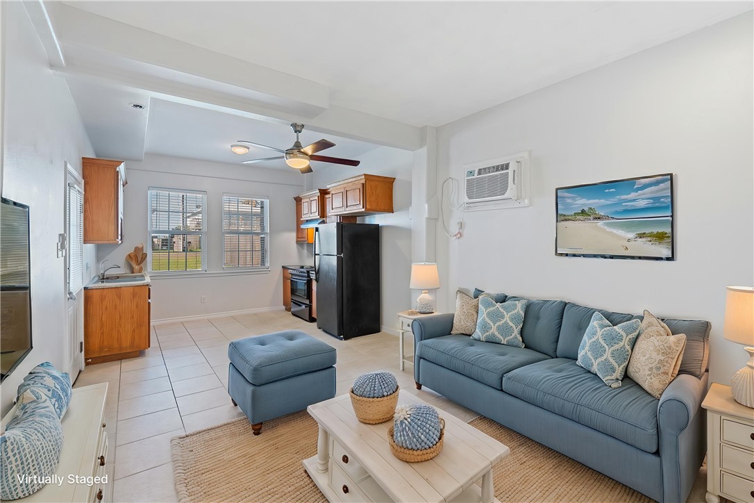 410 Knickerbocker Street Corpus Christi, TX 78418 - Photo 19 of 24 a living room with furniture and a couch