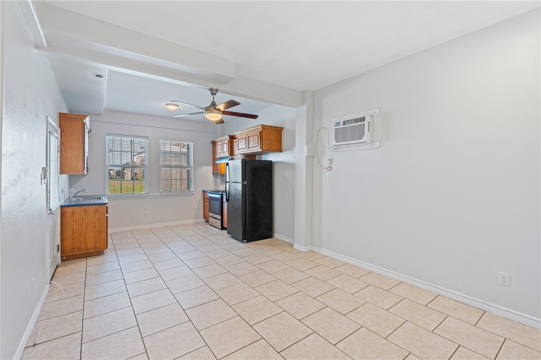 410 Knickerbocker Street Corpus Christi, TX 78418 - Photo 20 of 24 a view of an empty room with window and cabinet
