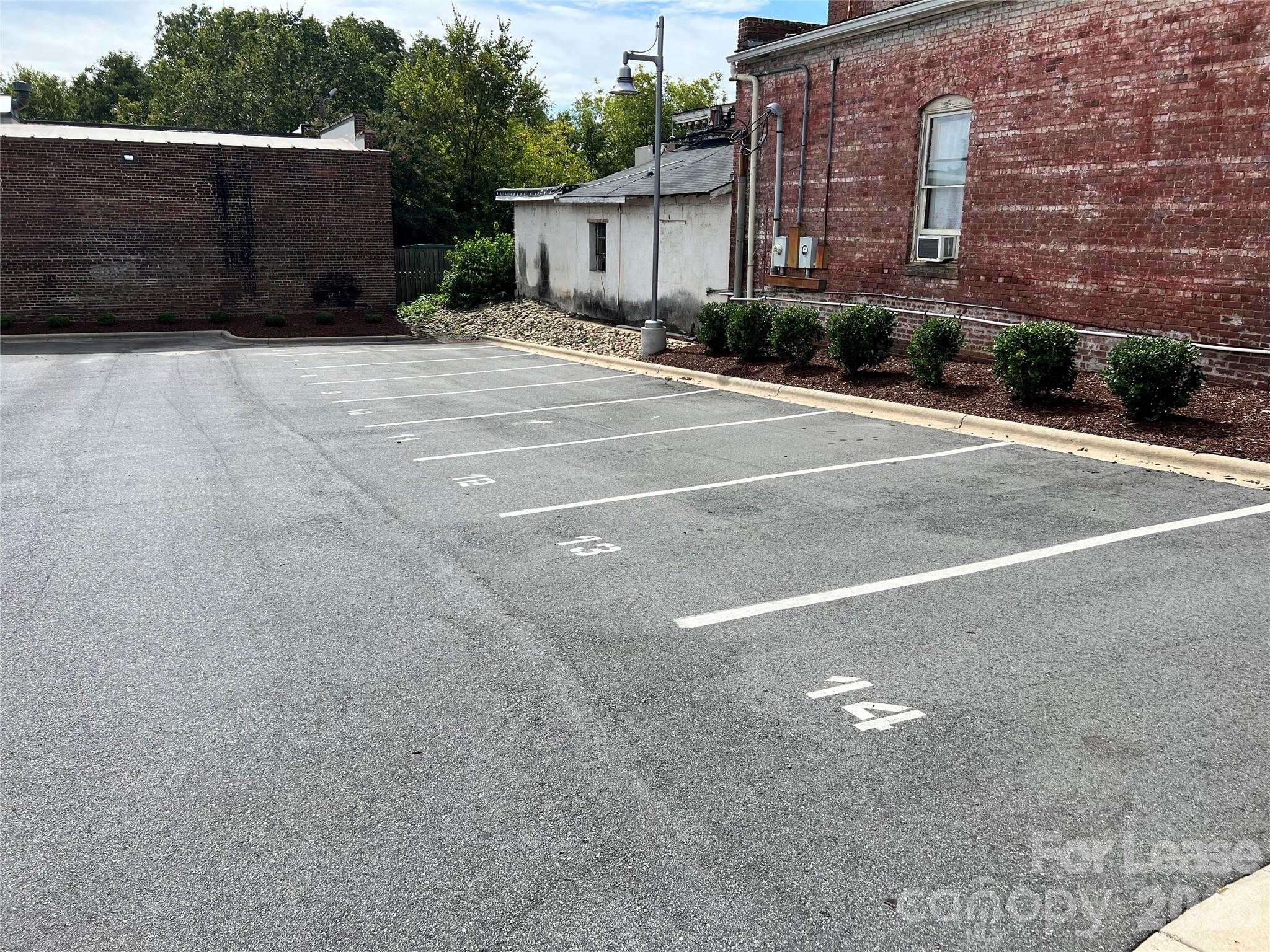 201 East Innes Street, Unit 204 Salisbury, NC 28144 - Photo 22 of 24 a view of a building with a street