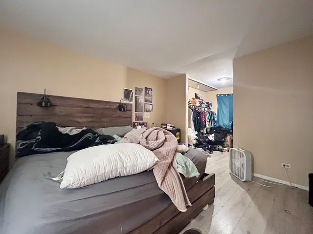 a bedroom with furniture and a couch