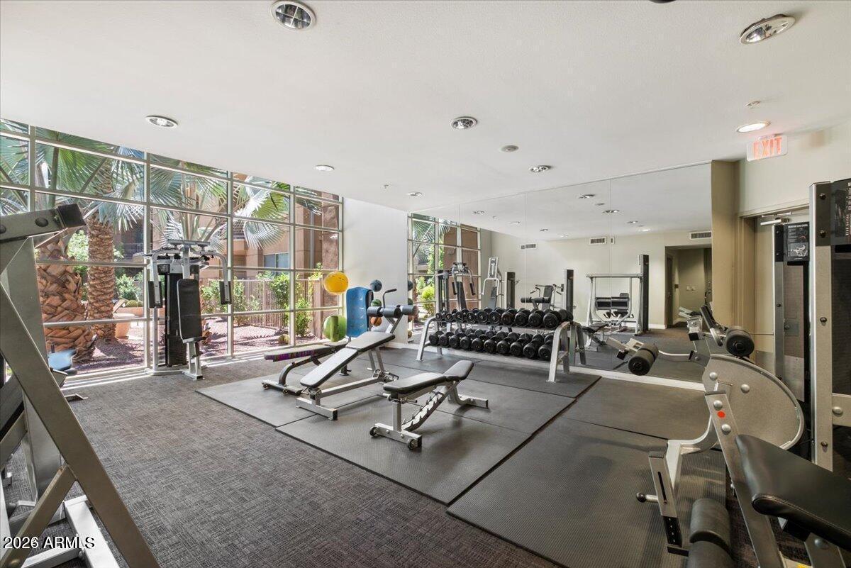 1701 East Colter Street, Unit 178 Phoenix, AZ 85016 - Photo 13 of 16 a view of a room with gym equipment