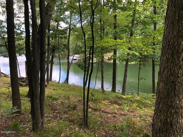 $749,900 | 8670 North Island Drive, Unit LOT 32 AND 33, Canadian Lakes, MI 49346