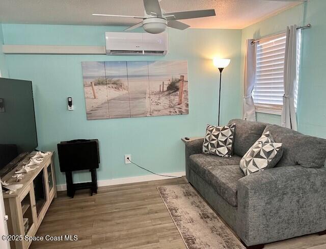406 Tyler Avenue, Unit 19 Cape Canaveral, FL 32920 - Photo 5 of 13 a living room with furniture and a flat screen tv