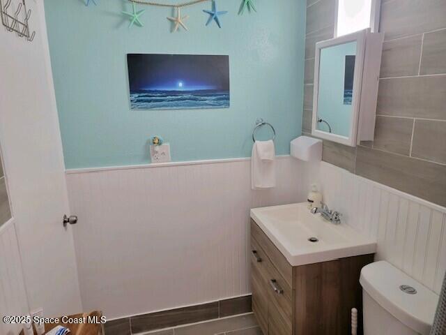 406 Tyler Avenue, Unit 19 Cape Canaveral, FL 32920 - Photo 9 of 13 a bathroom with a sink and a mirror