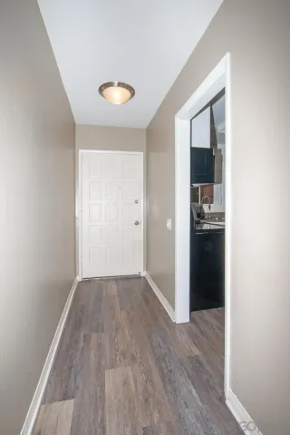 a view of an empty room with a window