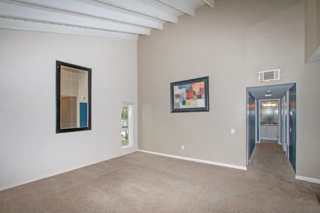 a view of hallway with livingroom
