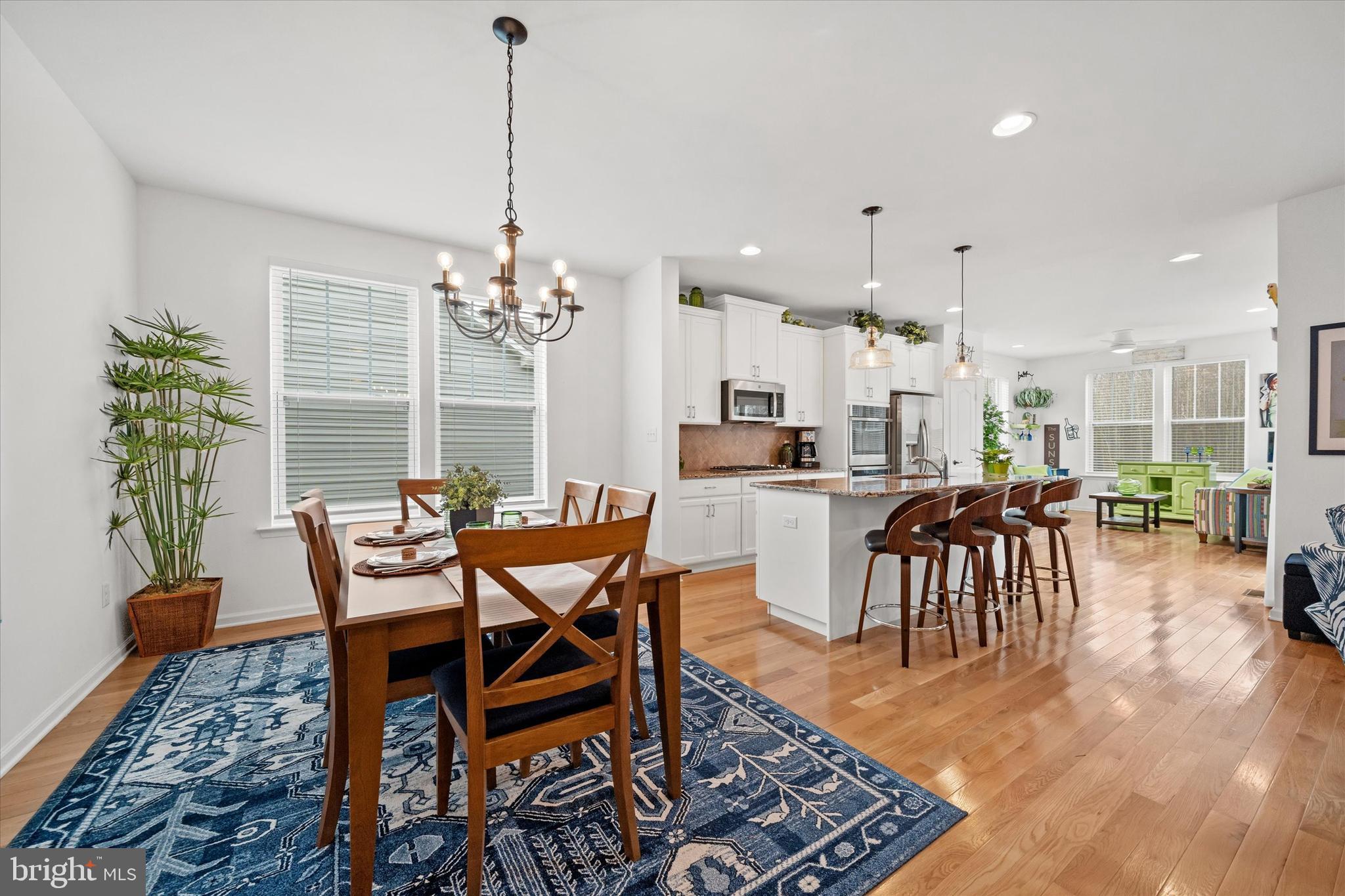 5338 Newman Lane Middletown, DE 19709 - Photo 14 of 61 a dining room with furniture a chandelier and window