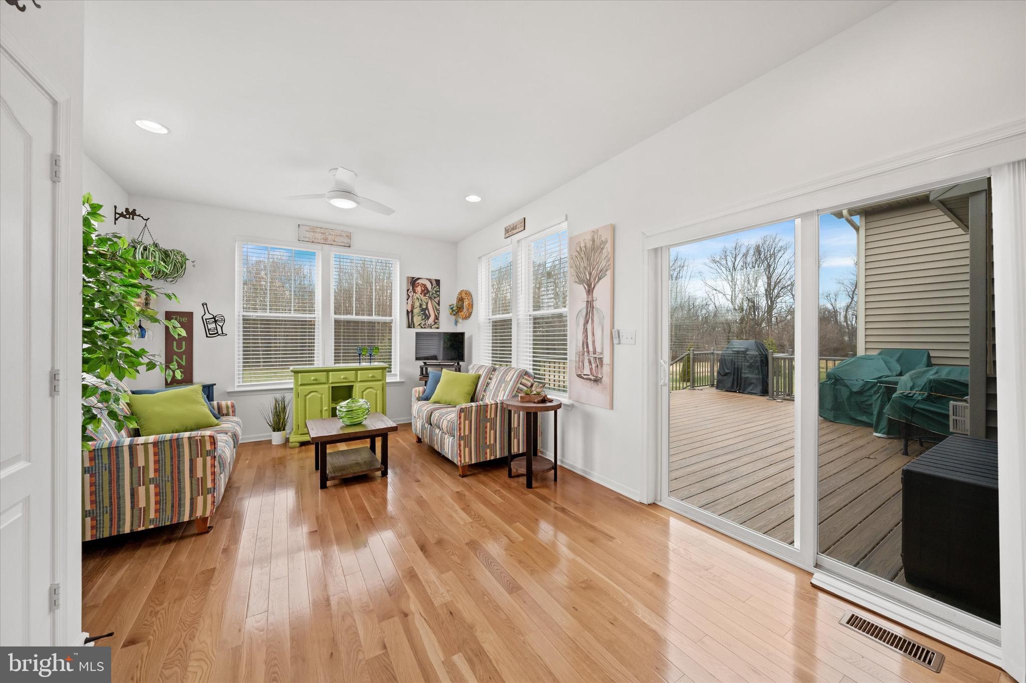 5338 Newman Lane Middletown, DE 19709 - Photo 28 of 61 a living room with furniture and a wooden floor