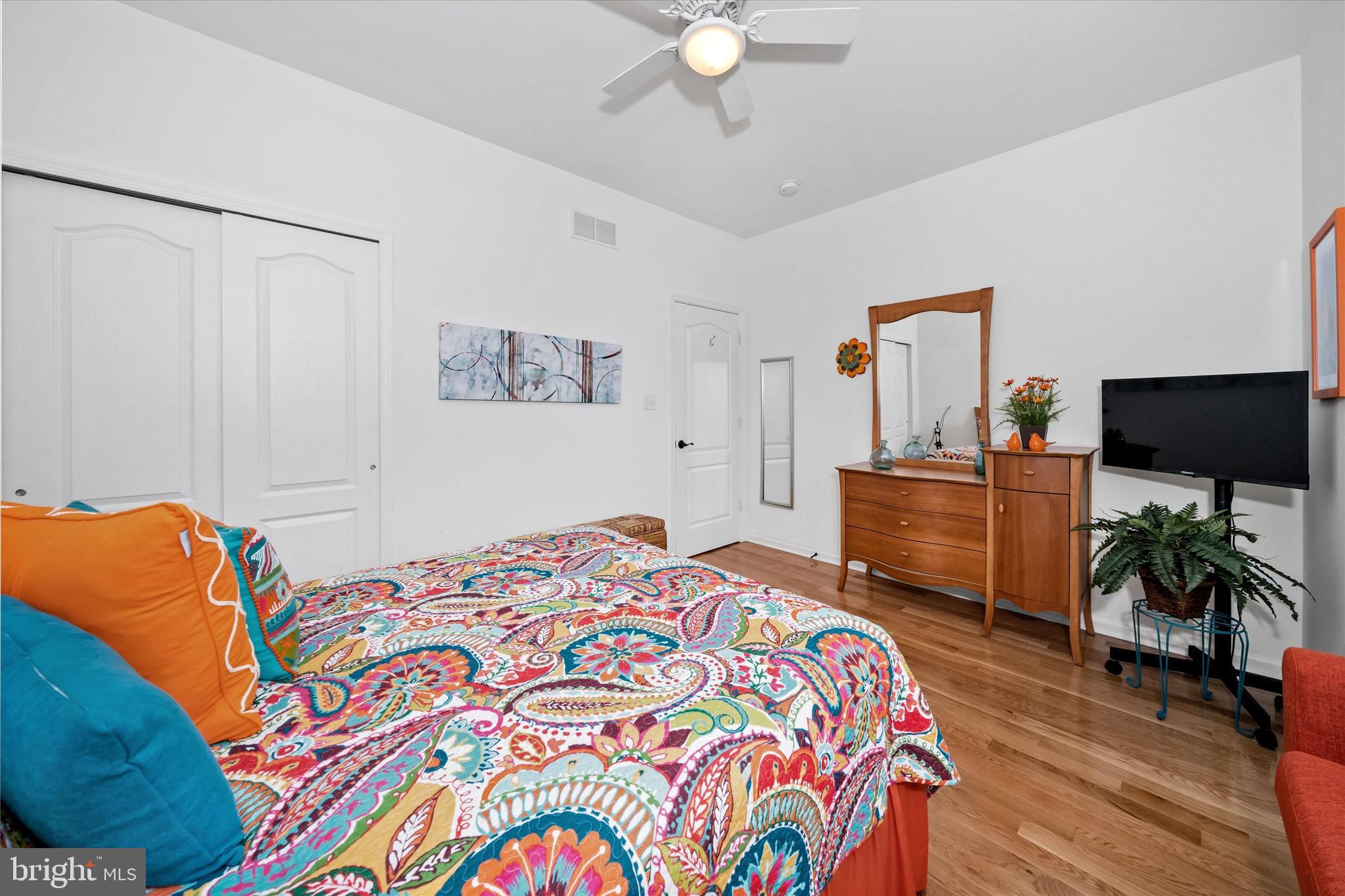 5338 Newman Lane Middletown, DE 19709 - Photo 37 of 61 a bedroom with a bed and a flat screen tv