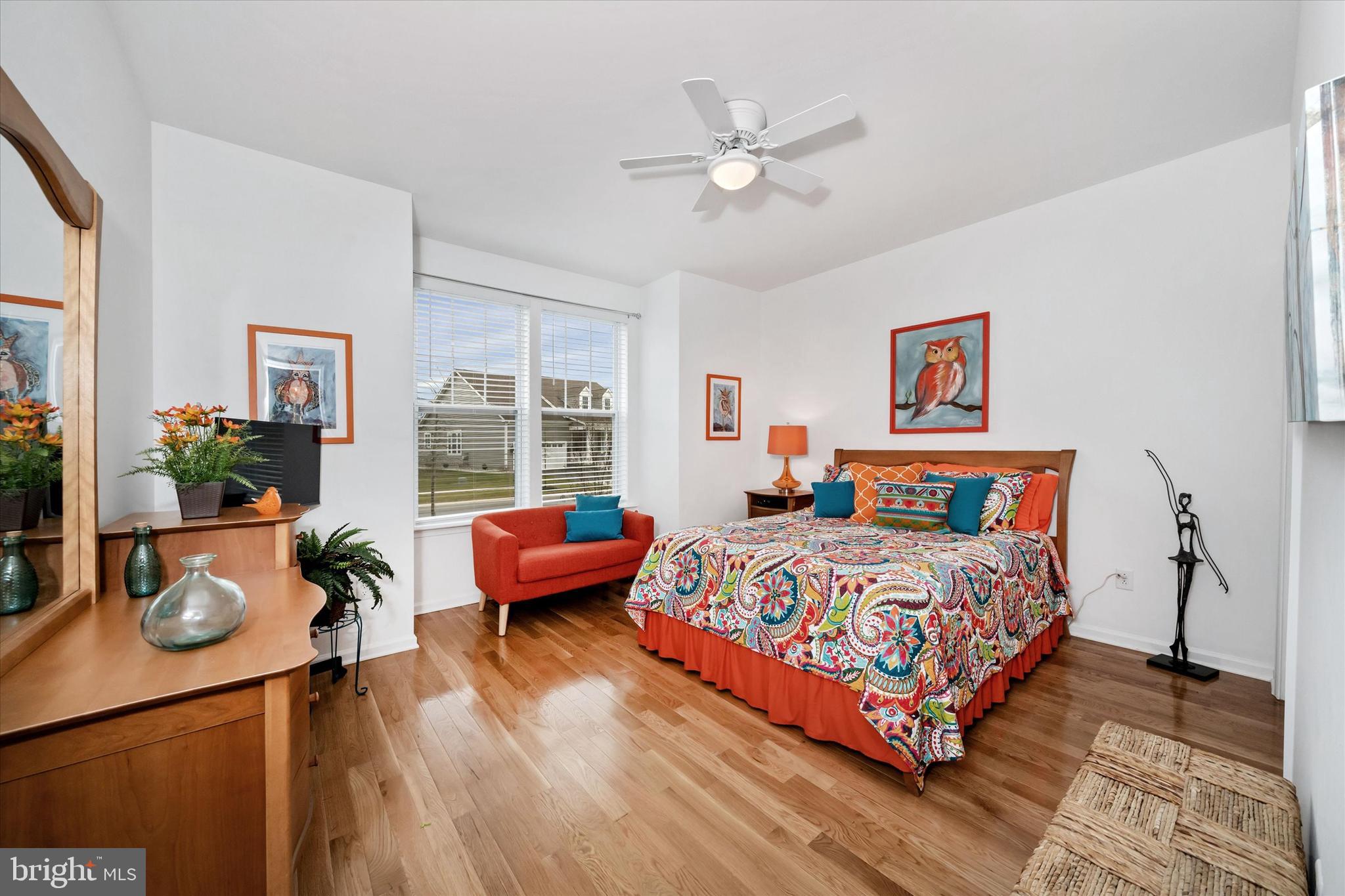 5338 Newman Lane Middletown, DE 19709 - Photo 38 of 61 a bedroom with bed and wooden floor