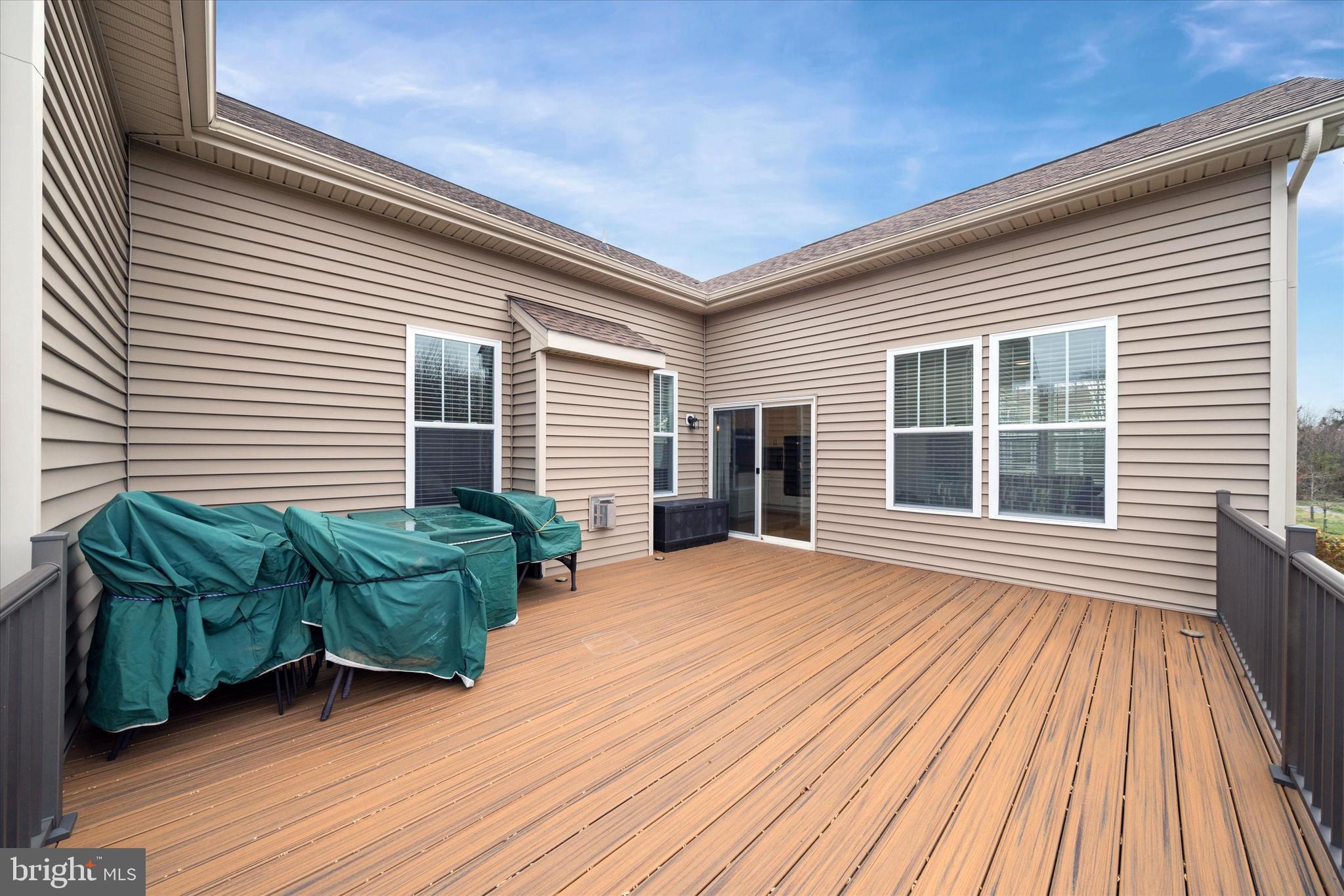5338 Newman Lane Middletown, DE 19709 - Photo 48 of 61 a view of backyard with deck and wooden floor