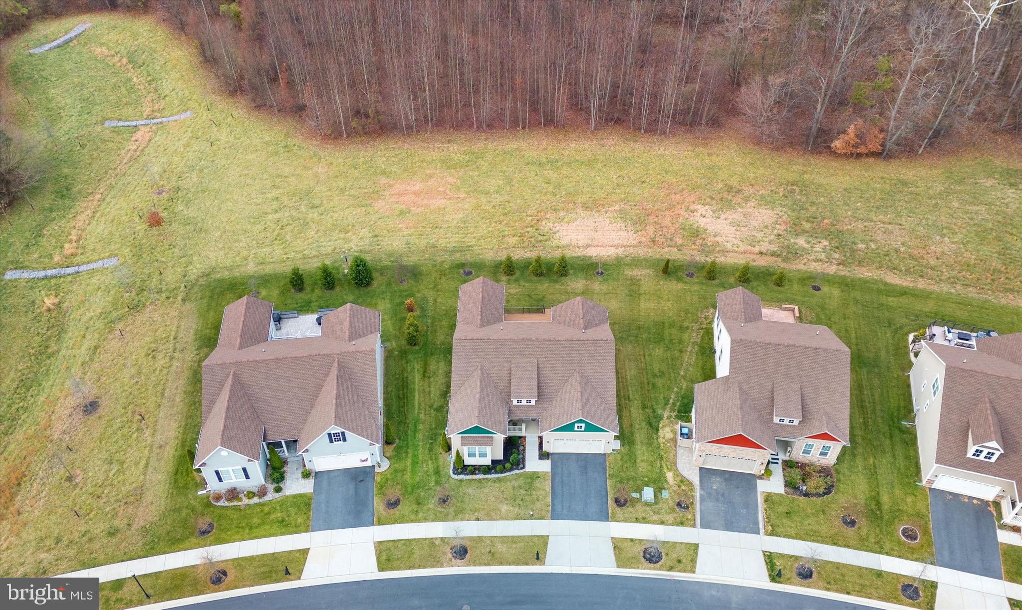 5338 Newman Lane Middletown, DE 19709 - Photo 55 of 61 an aerial view of residential houses with outdoor space and swimming pool
