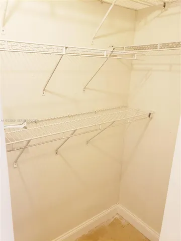 a bathroom with a toilet sink and a bathtub