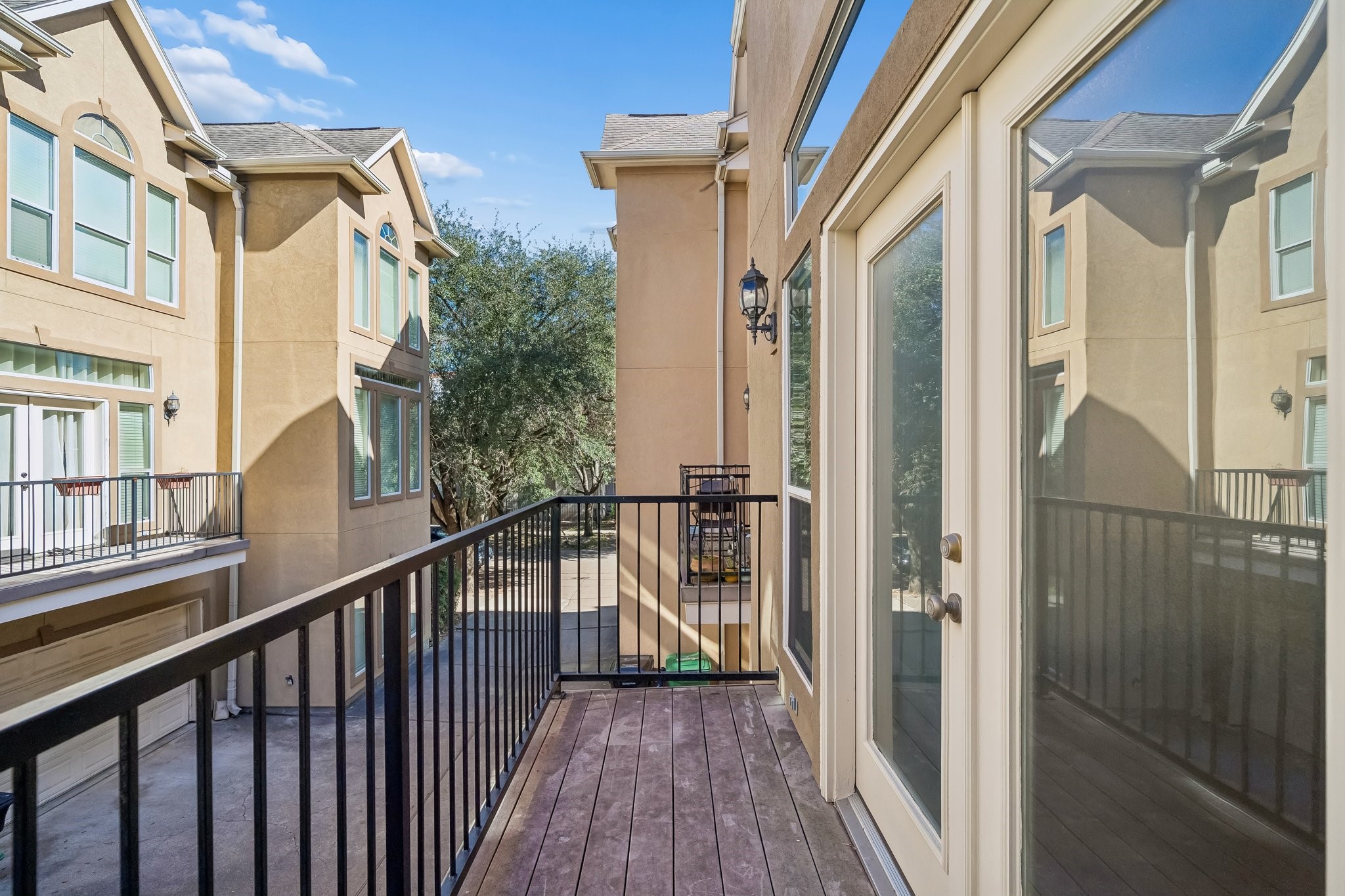 1415 Birdsall Street Houston, TX 77007 - Photo 23 of 25 a view of a balcony with wooden floor and stairs