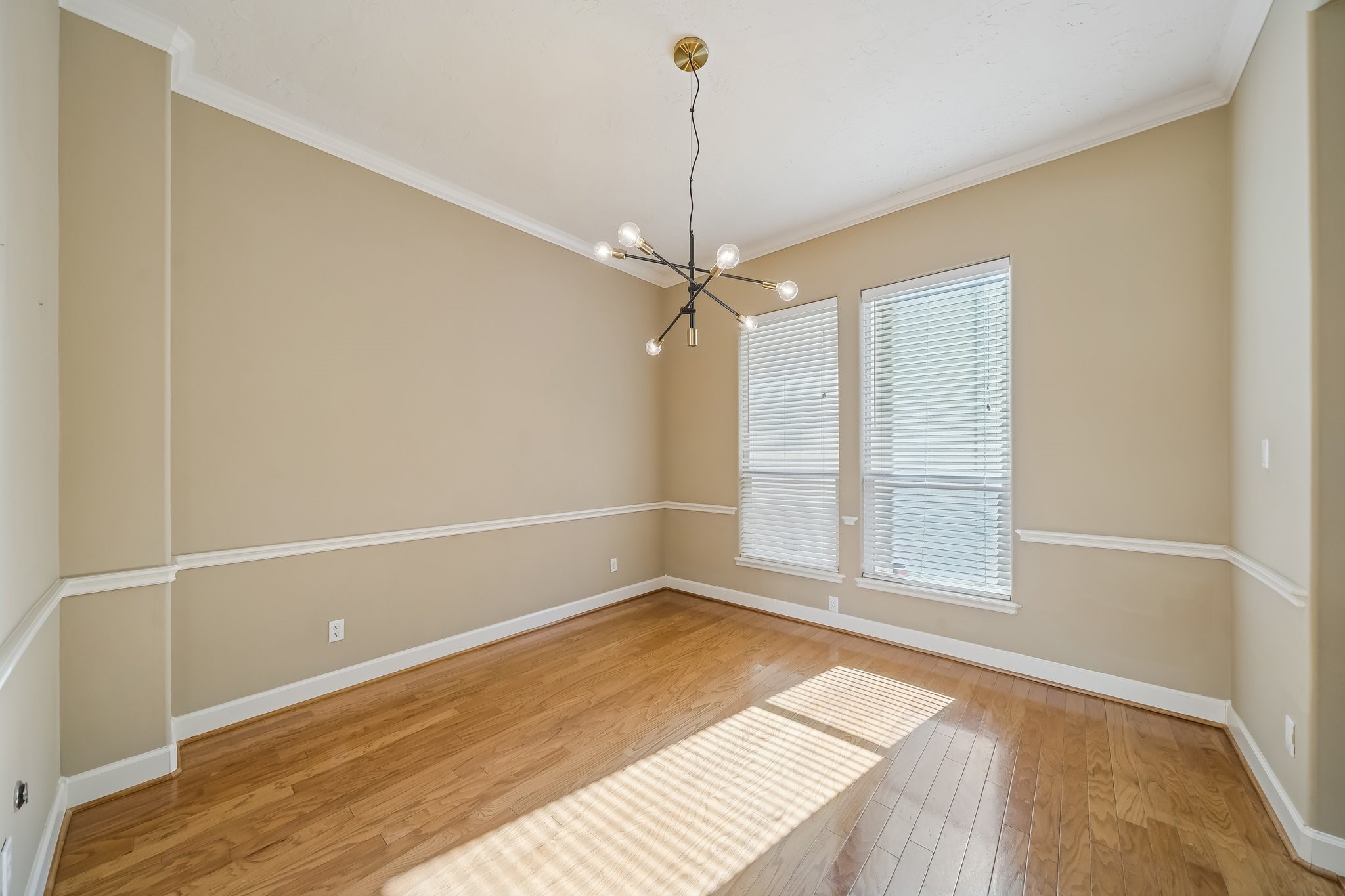 1415 Birdsall Street Houston, TX 77007 - Photo 10 of 25 a view of a room with wooden floor and white walls