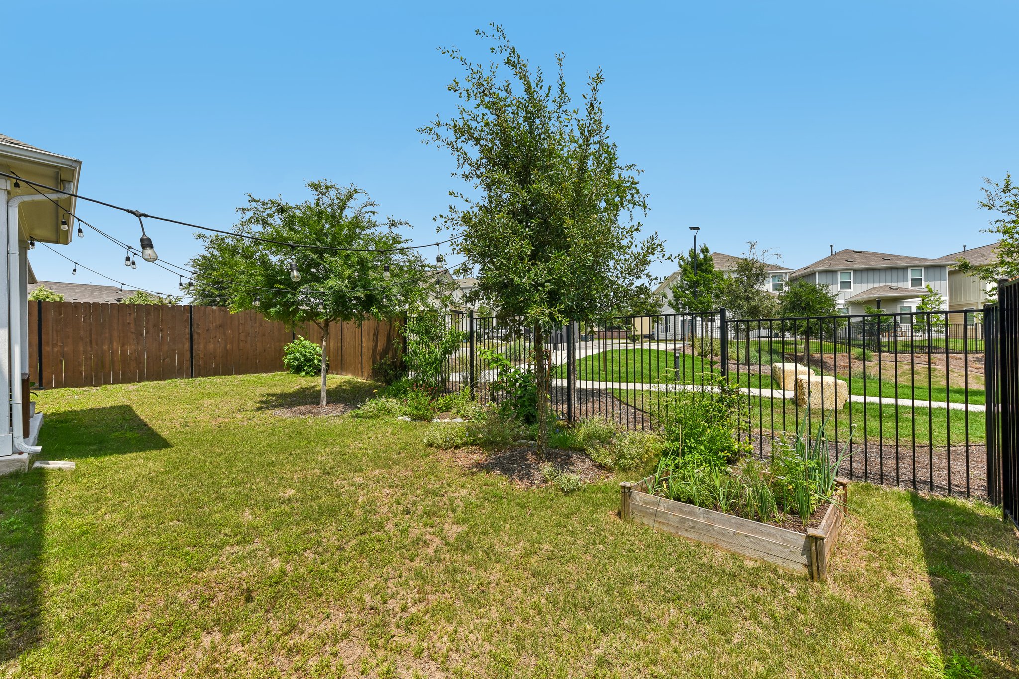 9901 Thane Way, Unit 91 Austin, TX 78748 - Photo 3 of 24 Lush backyard is one of the biggest and most private in the neighborhood. With a raised bed for gardening and plenty of room for entertaining.