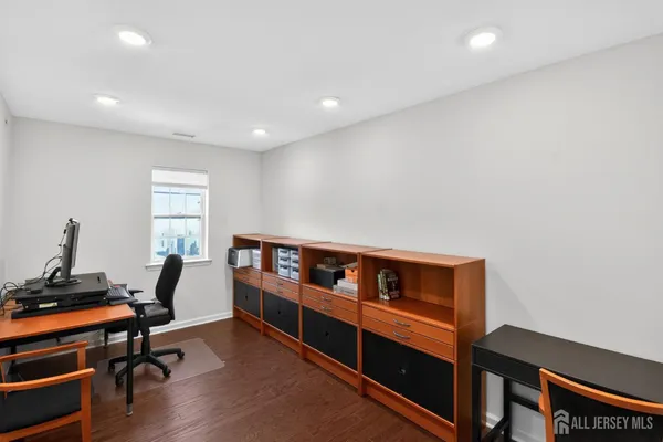 a hallway with a workspace