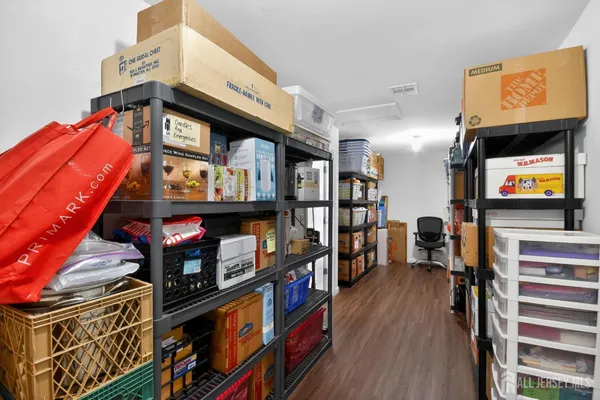 a view of a room with racks on the wall