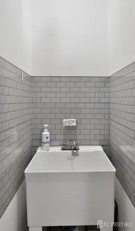 a bathroom with a sink a toilet