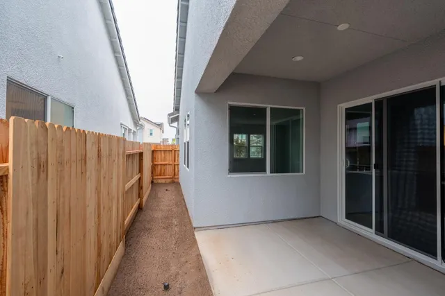 a view of a porch with wooden floor and stairs