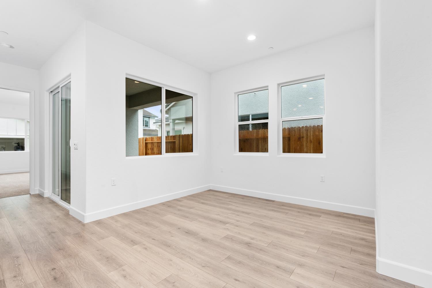 395 Peters Lane South Madera, CA 93636 - Photo 4 of 13 a view of an empty room with a window