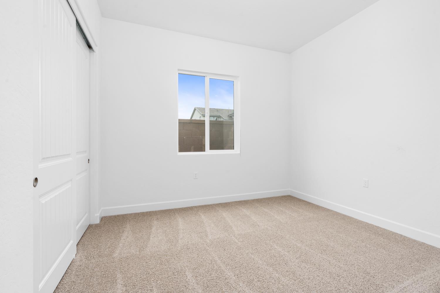395 Peters Lane South Madera, CA 93636 - Photo 9 of 13 an empty room with a window