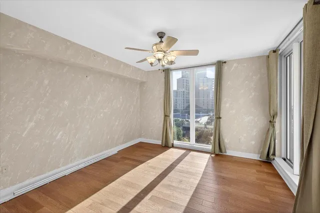 a view of a room with a large window