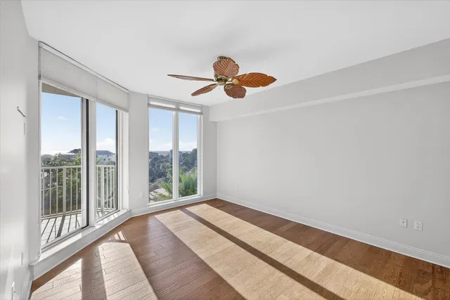 a view of a room with a large window