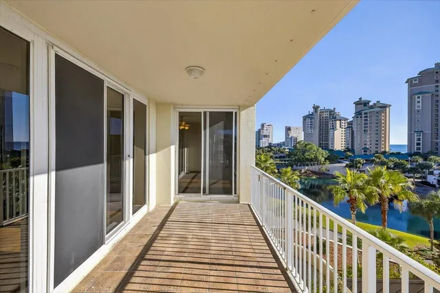 a view of balcony with furniture