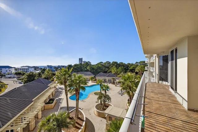 a view of a swimming pool with a patio