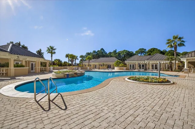 a view of a house with swimming pool