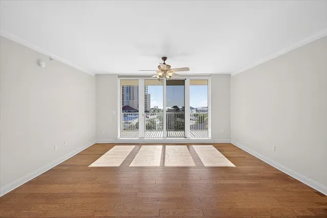 a view of an empty room with a balcony