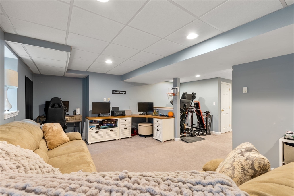 45 Auburn Road Millis, MA 02054 - Photo 25 of 31 a living room with furniture and a large window