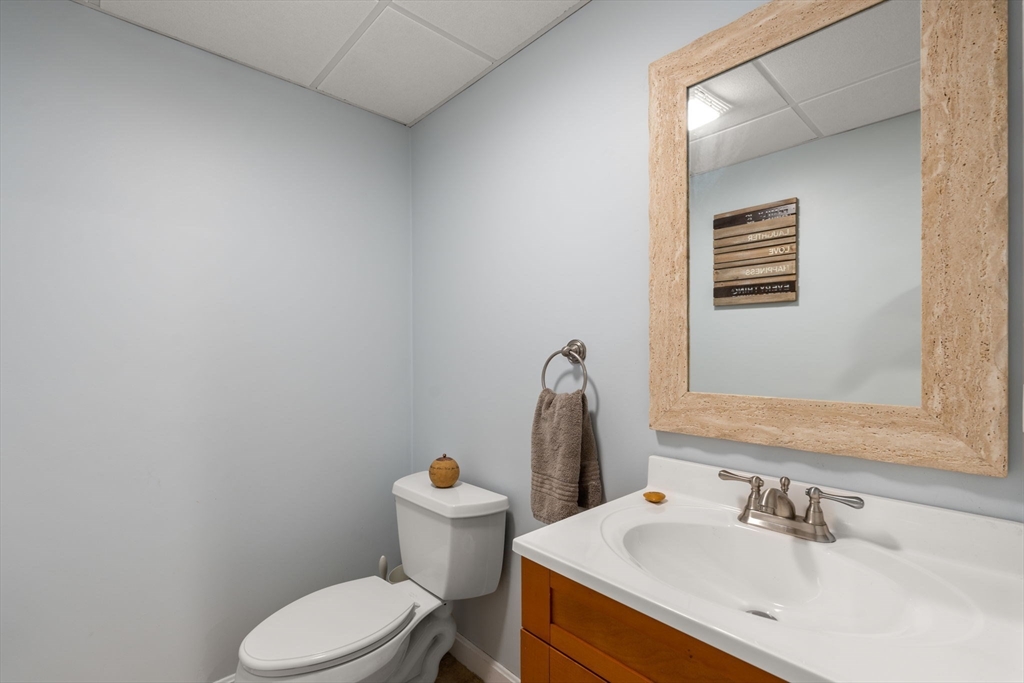 45 Auburn Road Millis, MA 02054 - Photo 26 of 31 a white toilet sitting next to a bathroom sink