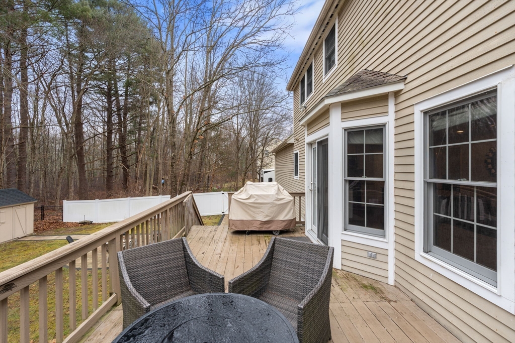 45 Auburn Road Millis, MA 02054 - Photo 27 of 31 a balcony with table and chairs