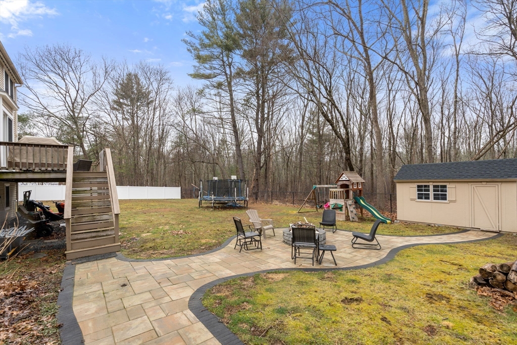 45 Auburn Road Millis, MA 02054 - Photo 29 of 31 a view of a swimming pool with sitting area